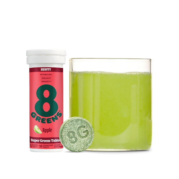 8Greens super greens tablet package in apple flavor with tablet and prepared in glass