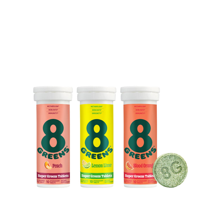 8Greens tablet packages in peach, lemon lime, and blood orange 