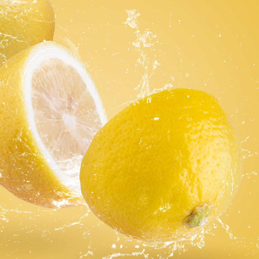 Lemon bursting open with juice coming out